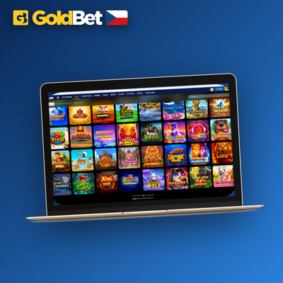 Hráč na cestách drží smartphone s aplikací Goldbet Casino na vlakovém nádraží